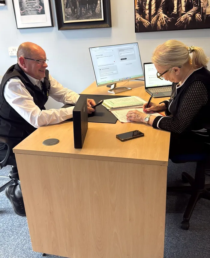 Going through a benefit entitlement check at the Tax for Taxi Drivers office