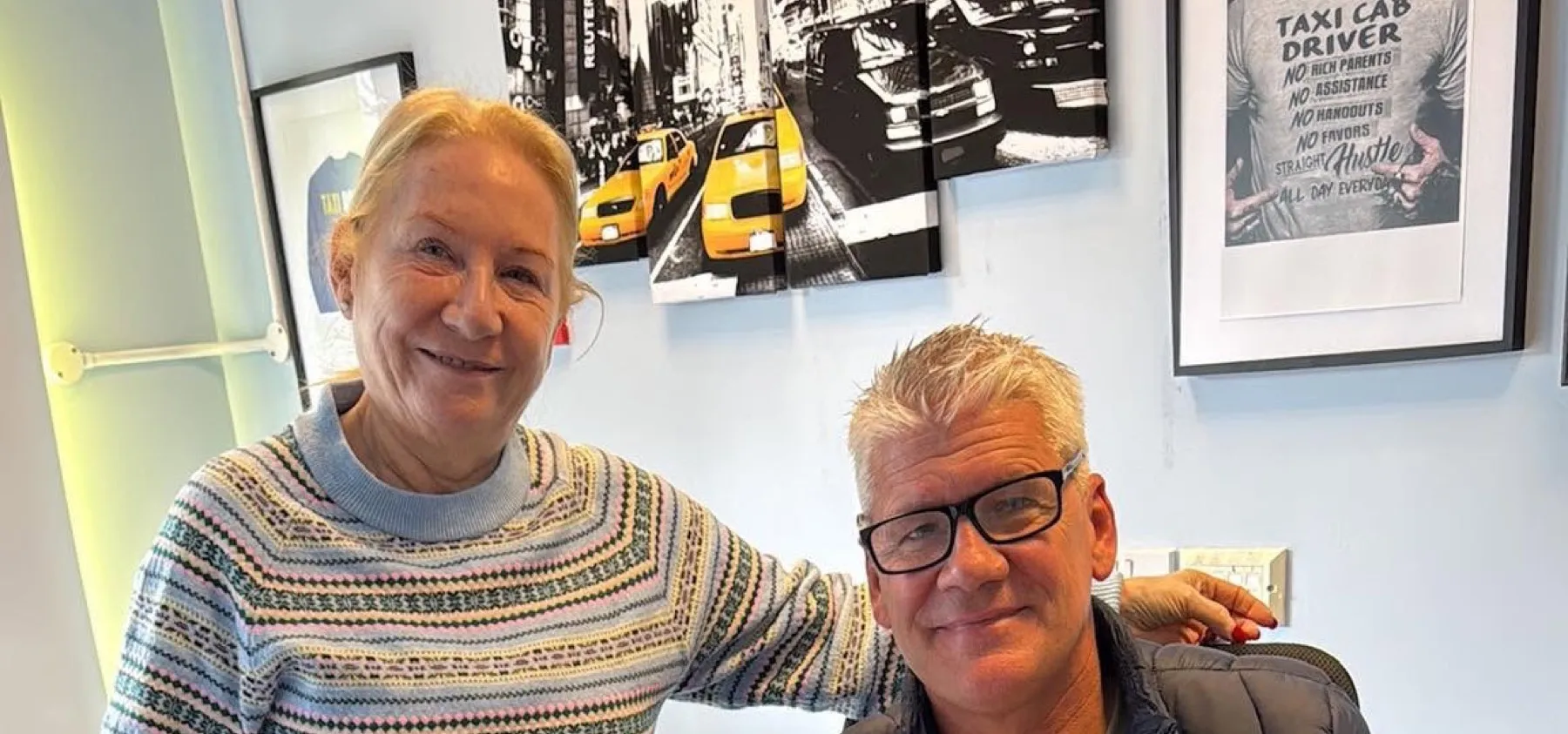 Michael with a client after reviewing their figures